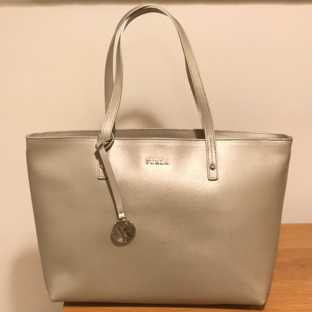 Brand new Furla bag in light GOLD (not pink)